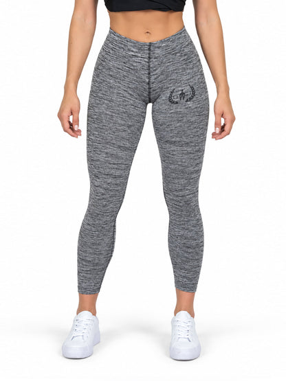 Legging fitness femme gris vu de face, chiné, taille haute avec logo Gym Generation sur la cuisse