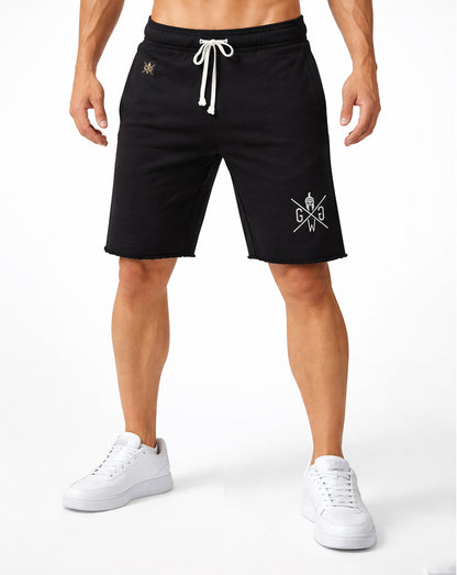 Schwarze Gym Shorts für Herren von Gym Generation am Model in voller Frontansicht – mit weißem Kordelzug, cleanem Fit und dezentem Logo am Bein