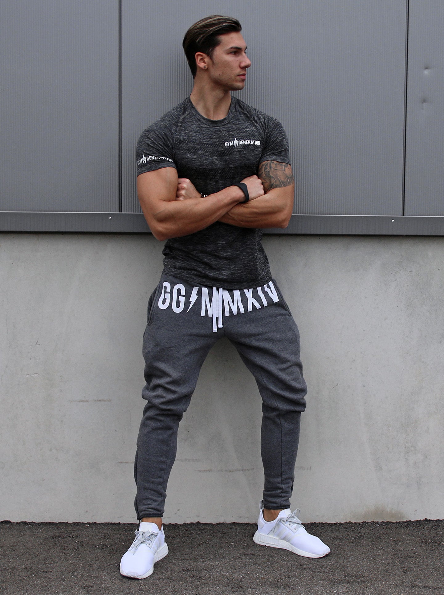 Grey gym pants with white logo – perfect for intense workouts.
