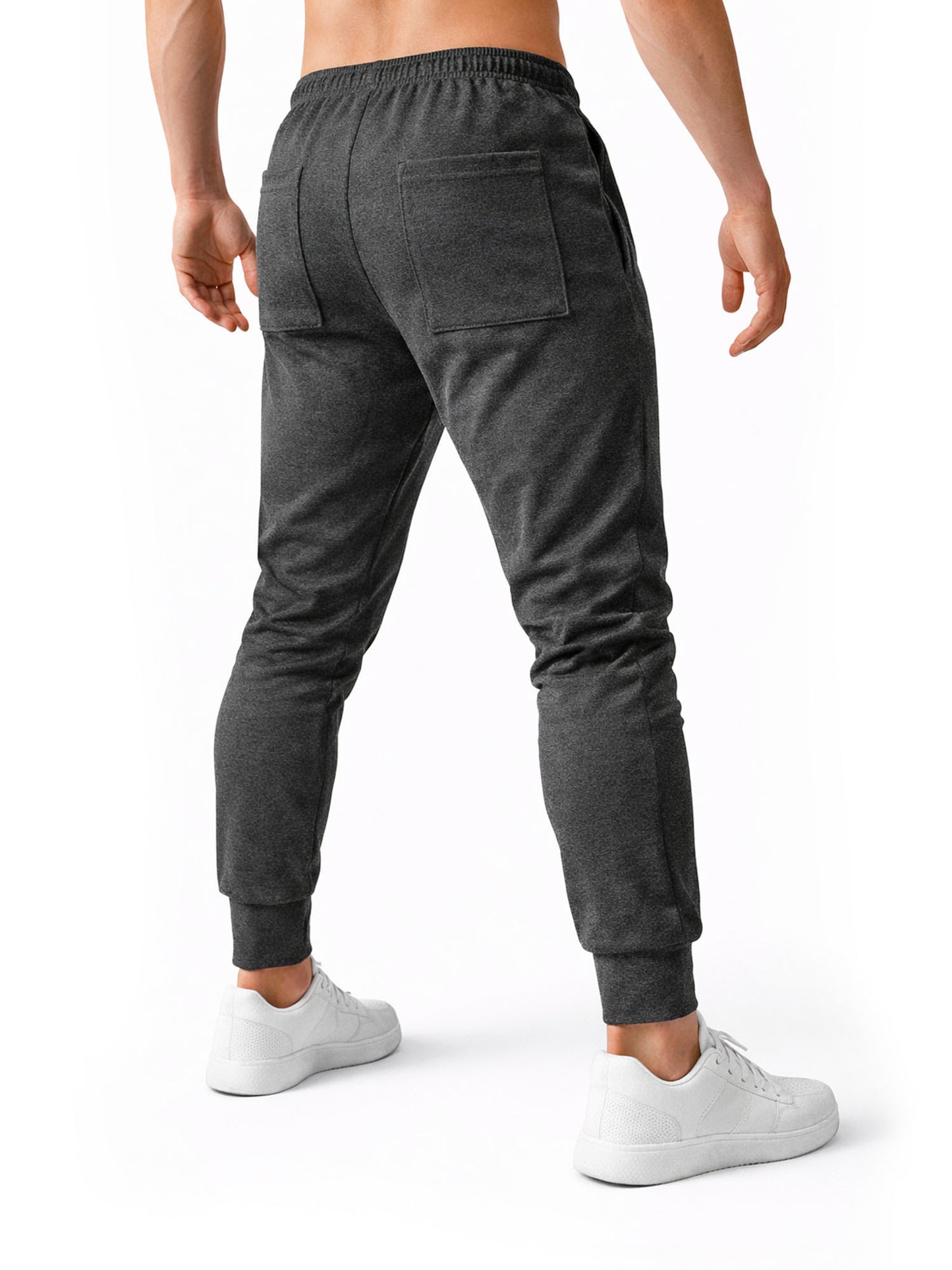 Rückansicht der Gym Generation Herren Trainingshose in Anthrazit mit tapered Fit, elastischem Bund und Gesäßtaschen, ideal für Fitness, Gym und Alltag