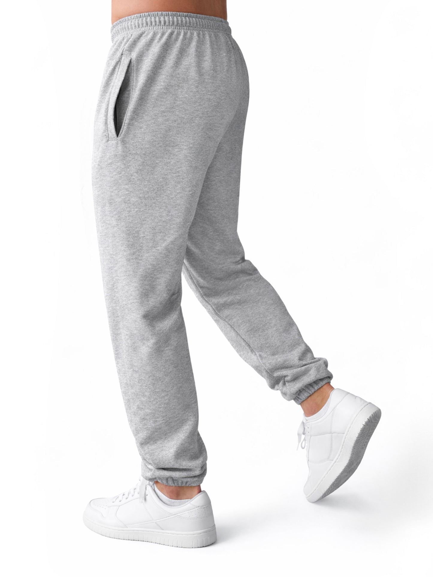 Seitenansicht der grauen Gym Generation Herren Jogginghose mit Baggy Fit aus French Terry, elastischem Bund und praktischer Seitentasche für Rest Day und Freizeit