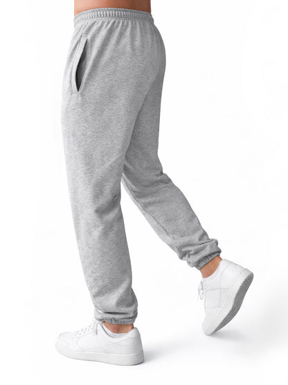Seitenansicht der grauen Gym Generation Herren Jogginghose mit Baggy Fit aus French Terry, elastischem Bund und praktischer Seitentasche für Rest Day und Freizeit