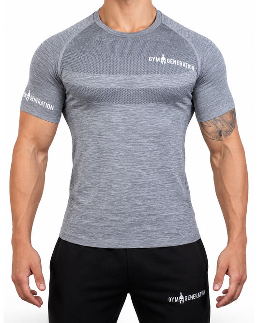 T-shirt seamless homme gris chiné de face, avec tricot nid d'abeille plus foncé sur la poitrine et lettrage Gym Generation blanc sur la poitrine et la manche