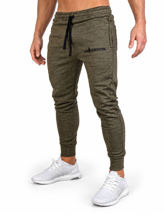 Angled front view of the olive 'Premium' gym pants, jogger cut with ribbed ankle cuffs, zippered side pocket and embroidered logo