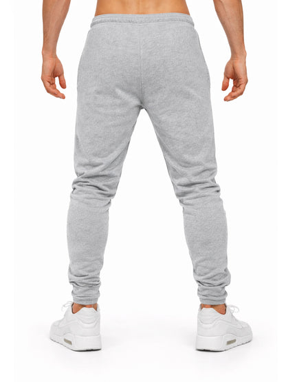 Gym Generation Herren Trainingshose grau getragen – Rückansicht Jogger mit tapered Fit für Fitness und Alltag