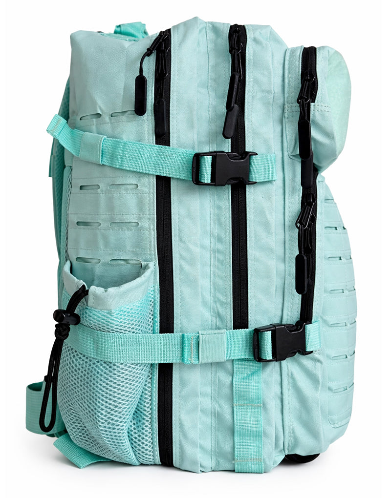 Seitenansicht des Gym Generation Fitness Rucksacks in Arctic Mint mit Kompressionsriemen, seitlicher Netztasche und robustem Material