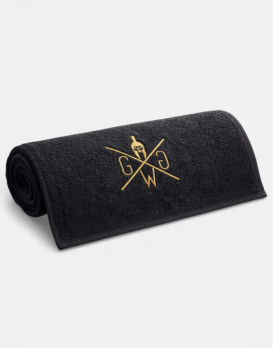 Luxuriöses Gym Handtuch schwarz mit goldenen Details von Gym Generation – Premium Fitnesshandtuch für anspruchsvolle Athleten und stilbewusste Sportler