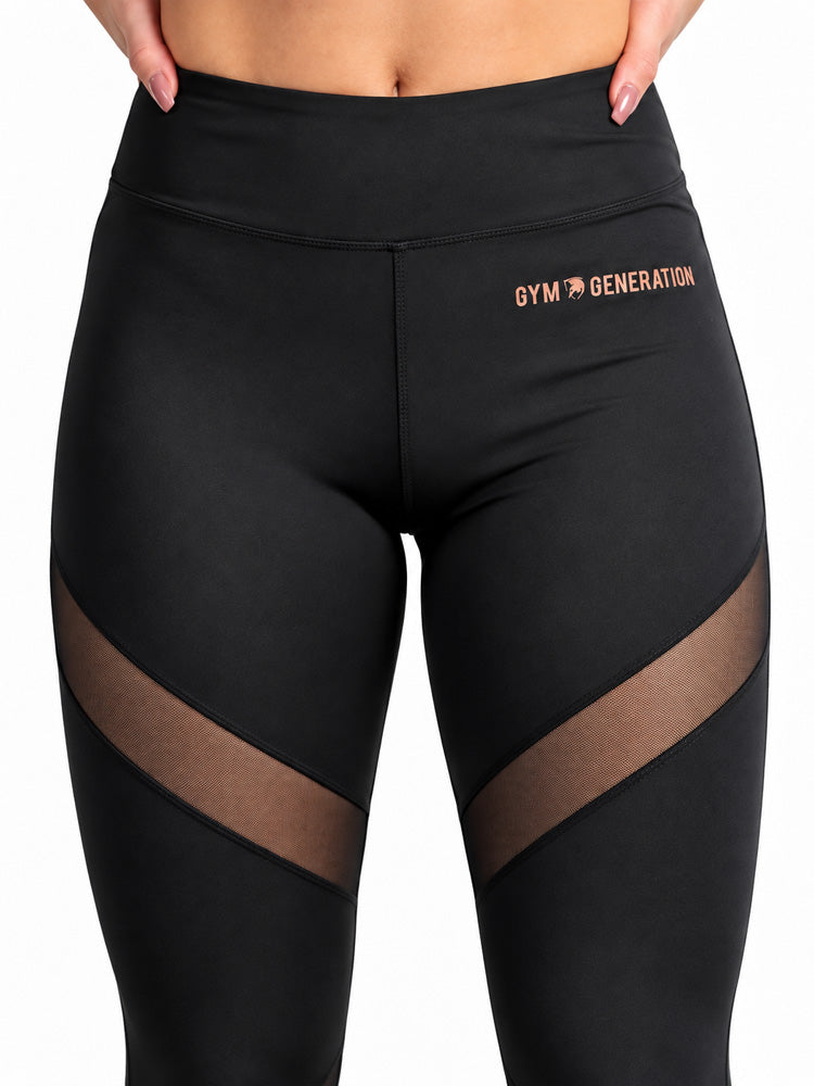Legging de sport femme noir, gros plan sur l’empiècement mesh et le lettrage Gym Generation or rose