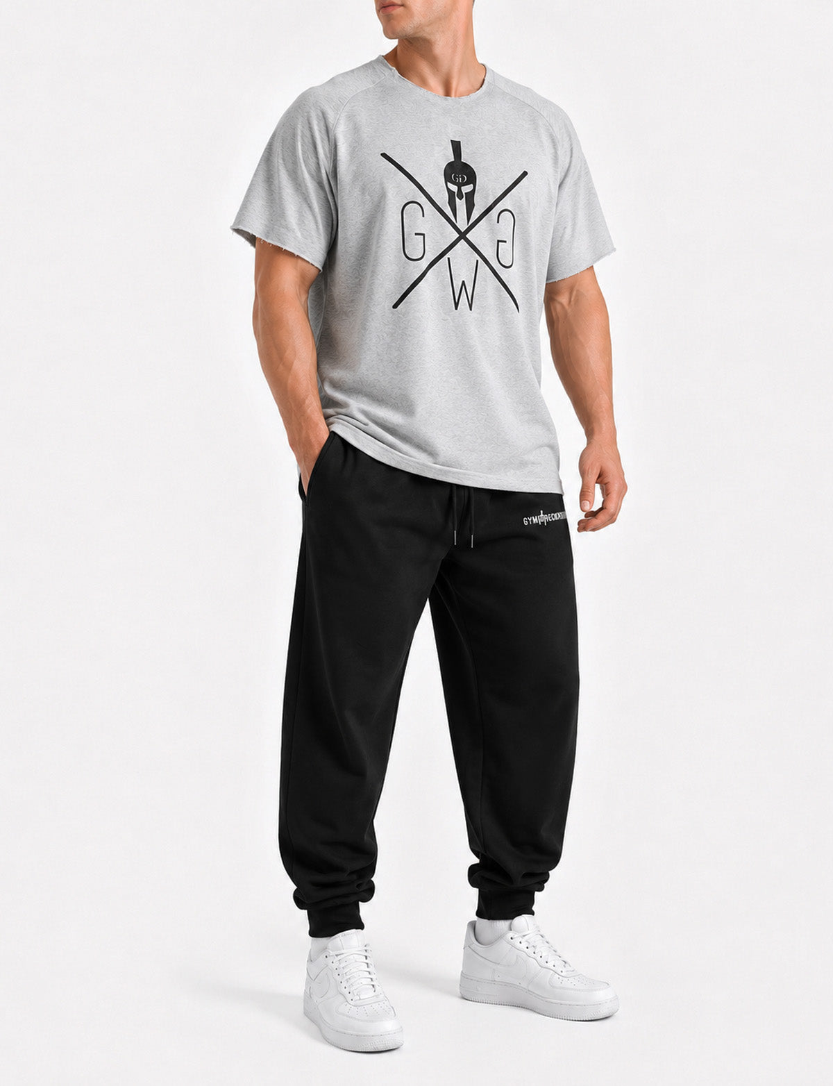 Graues Oversized Pump Cover Shirt Herren von Gym Generation mit grossem schwarzem Gym Warriors Frontprint, Raw-Cut-Ärmeln und lockerem Streetwear-Fit am Athleten