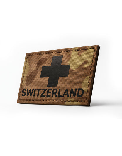 Taktischer Schweiz Patch aus PVC im Militärtarn-Design mit starkem Klettverschluss und schwarzem Swiss Cross, ideal für Rucksäcke, Plate Carrier und Training Bags